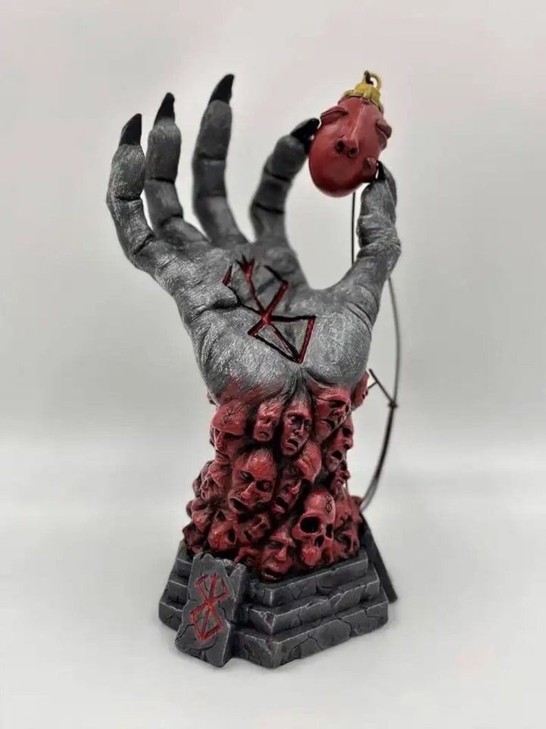 Berserk : God Hand Sculpture & Behelit Necklace